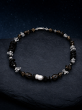 Ash Sequence Smoky Quartz Necklace front view on a dark atmospheric backdrop