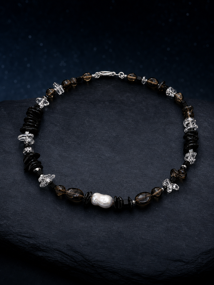 Ash Sequence Smoky Quartz Necklace front view on a dark atmospheric backdrop