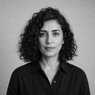 Black and white portrait of Amina Darzi