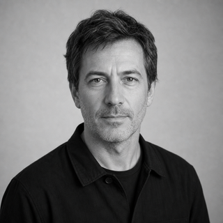 Black and white portrait of Daniel Moreau