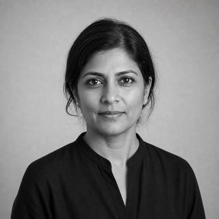 Black and white portrait of Priya Nair