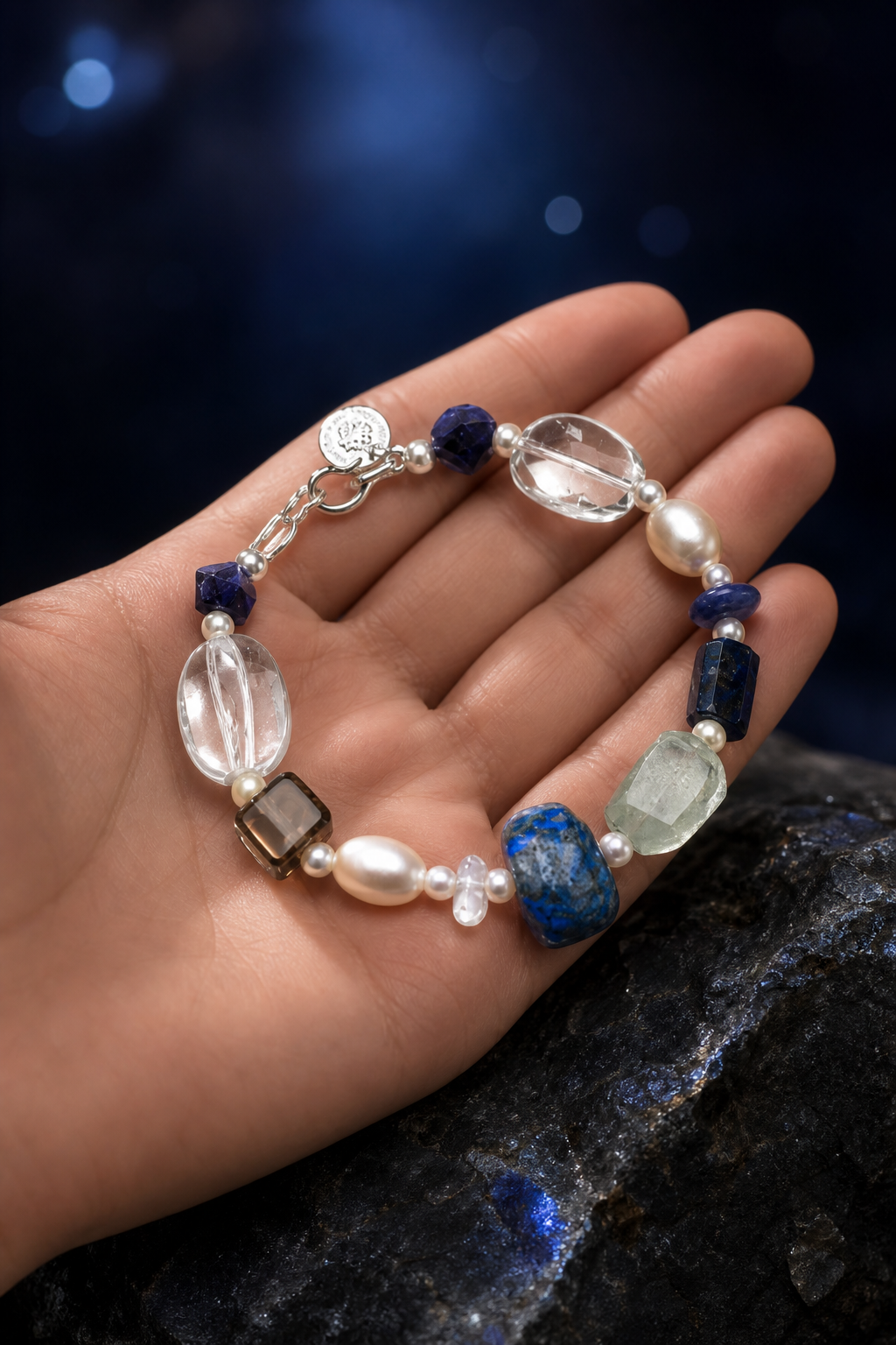 Azure Core Lapis Quartz Bracelet shown in hand for scale