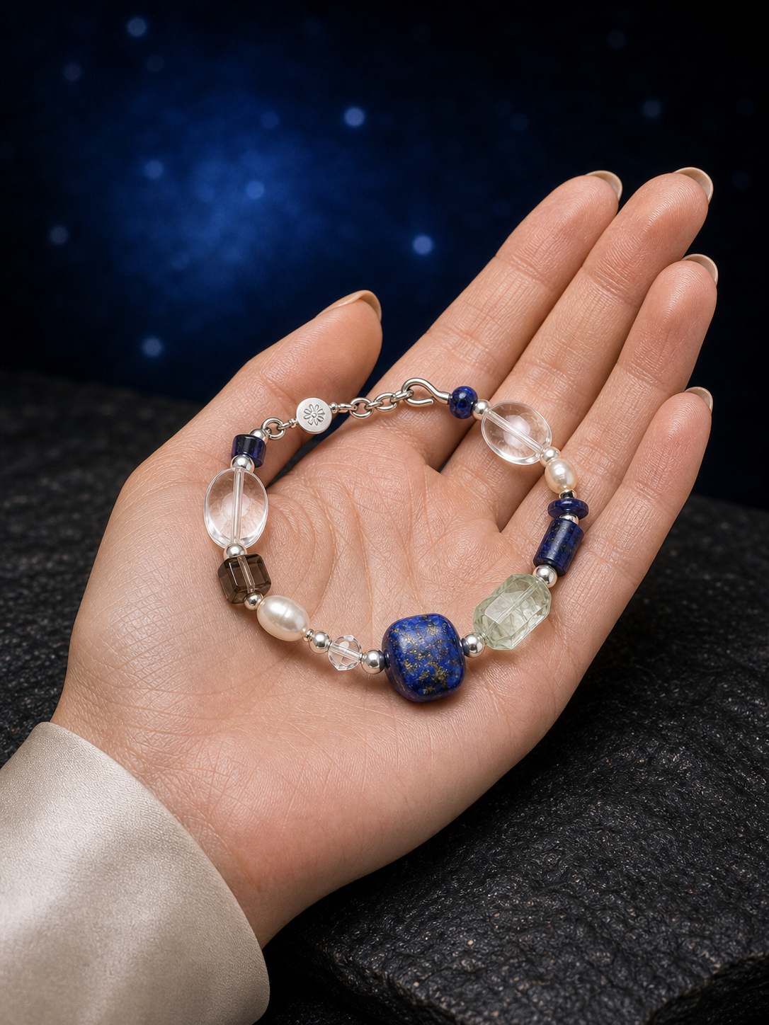 Azure Prism Lapis Quartz Bracelet shown in hand for scale
