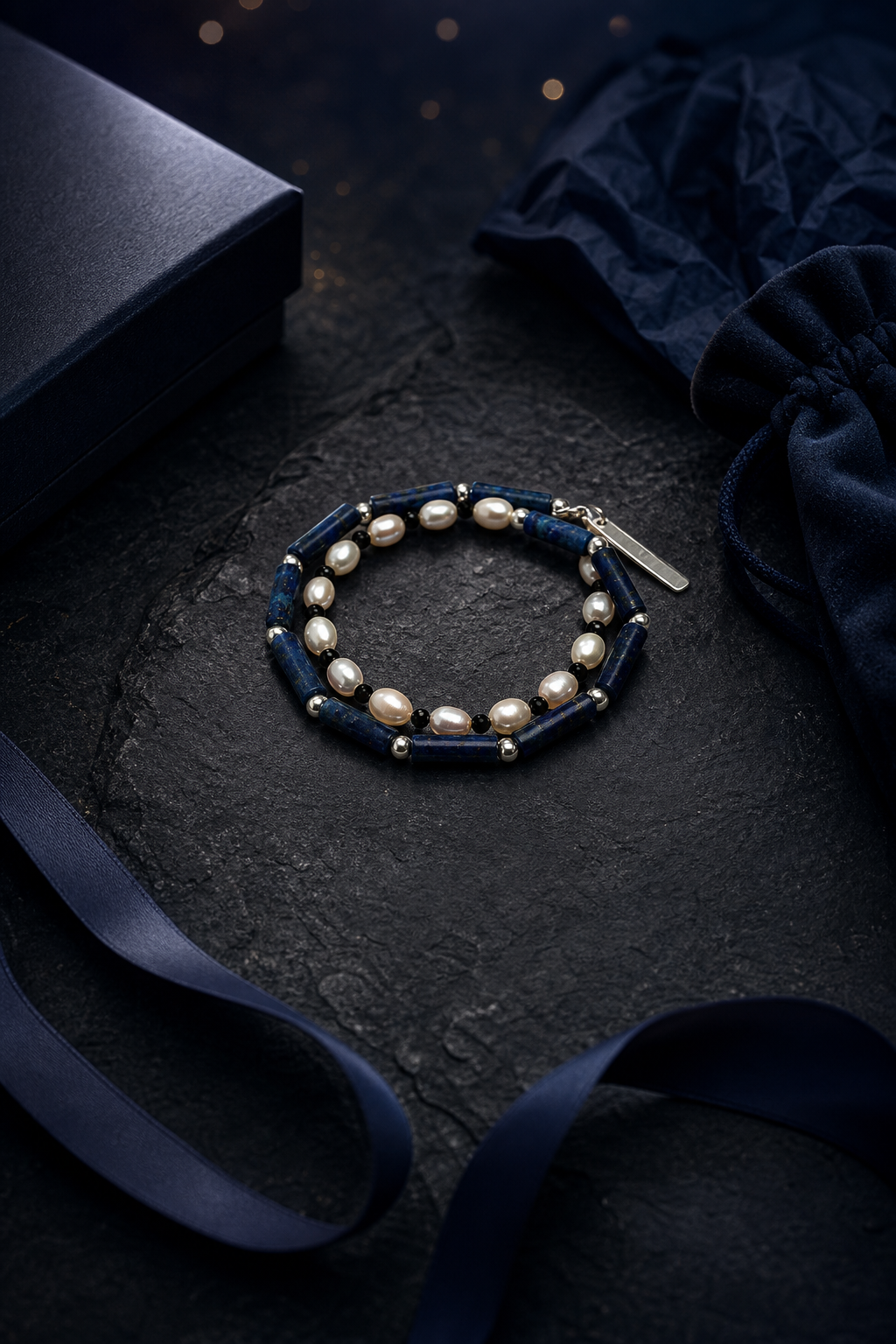 Blue Sentinel Pearl Bracelet packaging flat lay