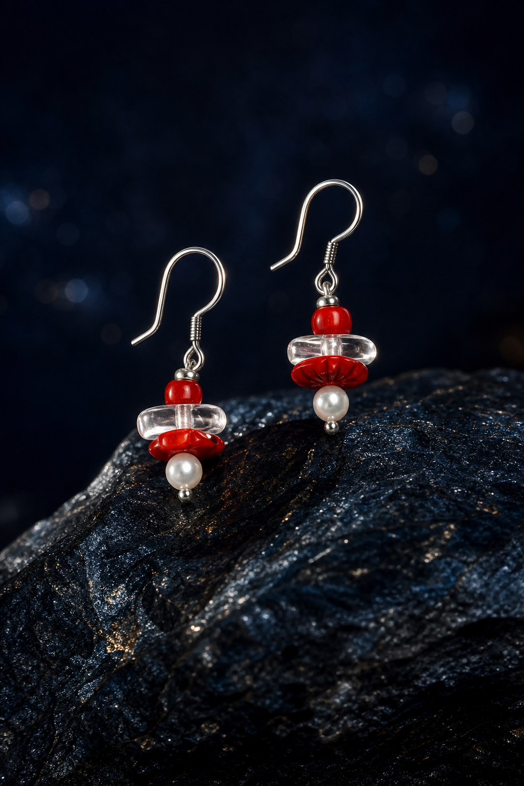 Crimson Overture Agate Earrings front view on a dark atmospheric backdrop