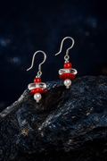 Crimson Overture Agate Earrings front view on a dark atmospheric backdrop
