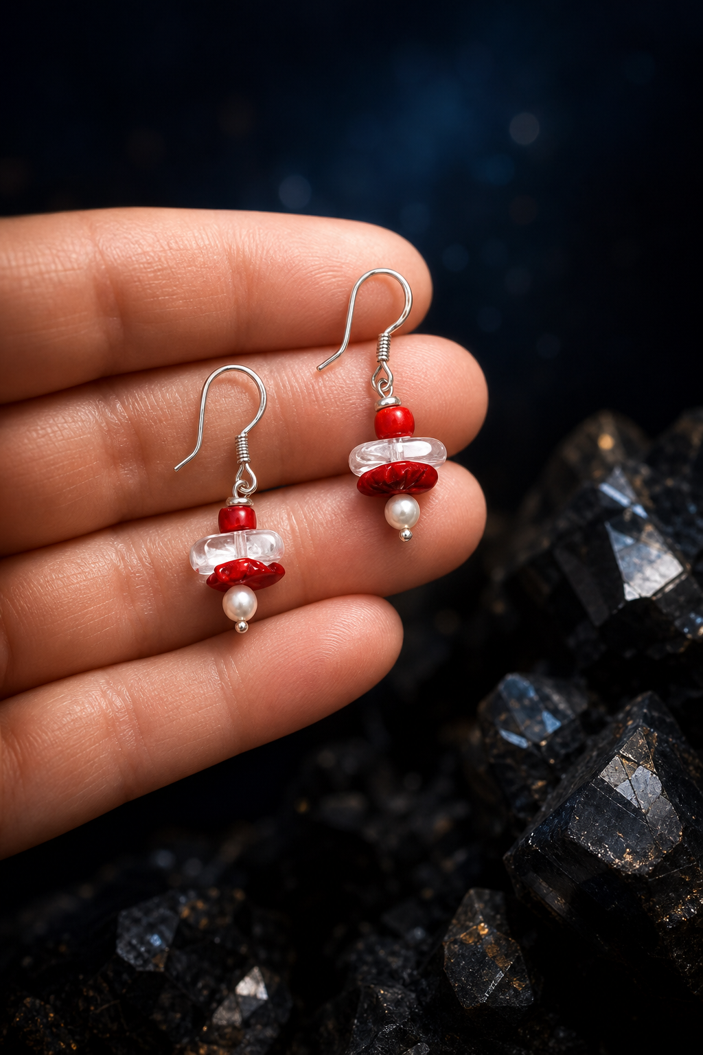 Crimson Overture Agate Earrings shown in hand for scale