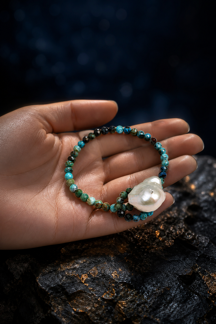 Forest Glow Pearl Bracelet shown in hand for scale