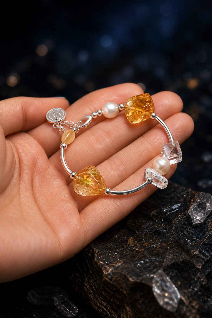 Golden Link Citrine Pearl Bracelet shown in hand for scale