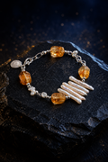 Honey Fringe Citrine Pearl Bracelet front view on a dark atmospheric backdrop