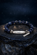 Ice Current Blue Pearl Bracelet front view on a dark atmospheric backdrop