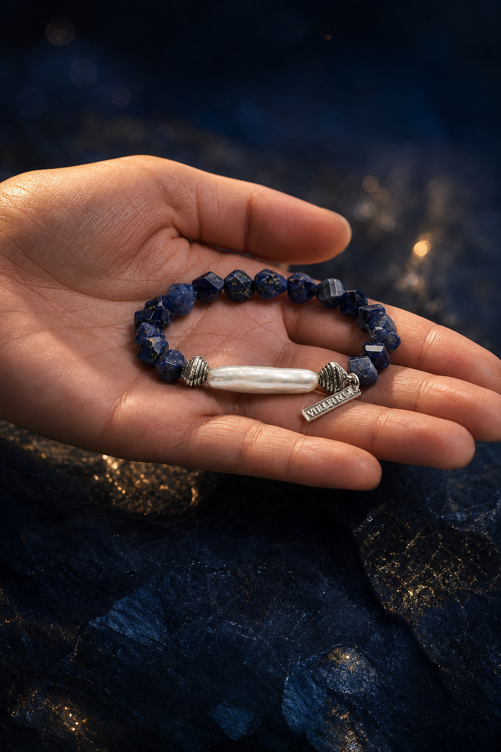 Ice Current Blue Pearl Bracelet shown in hand for scale