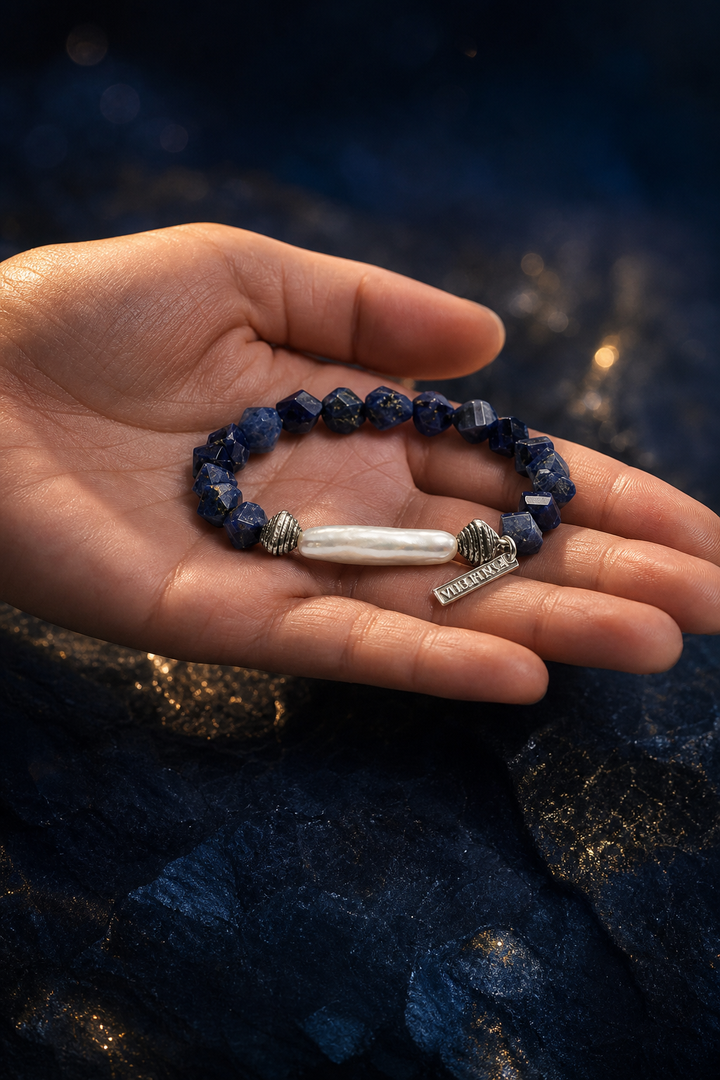 Ice Current Blue Pearl Bracelet shown in hand for scale