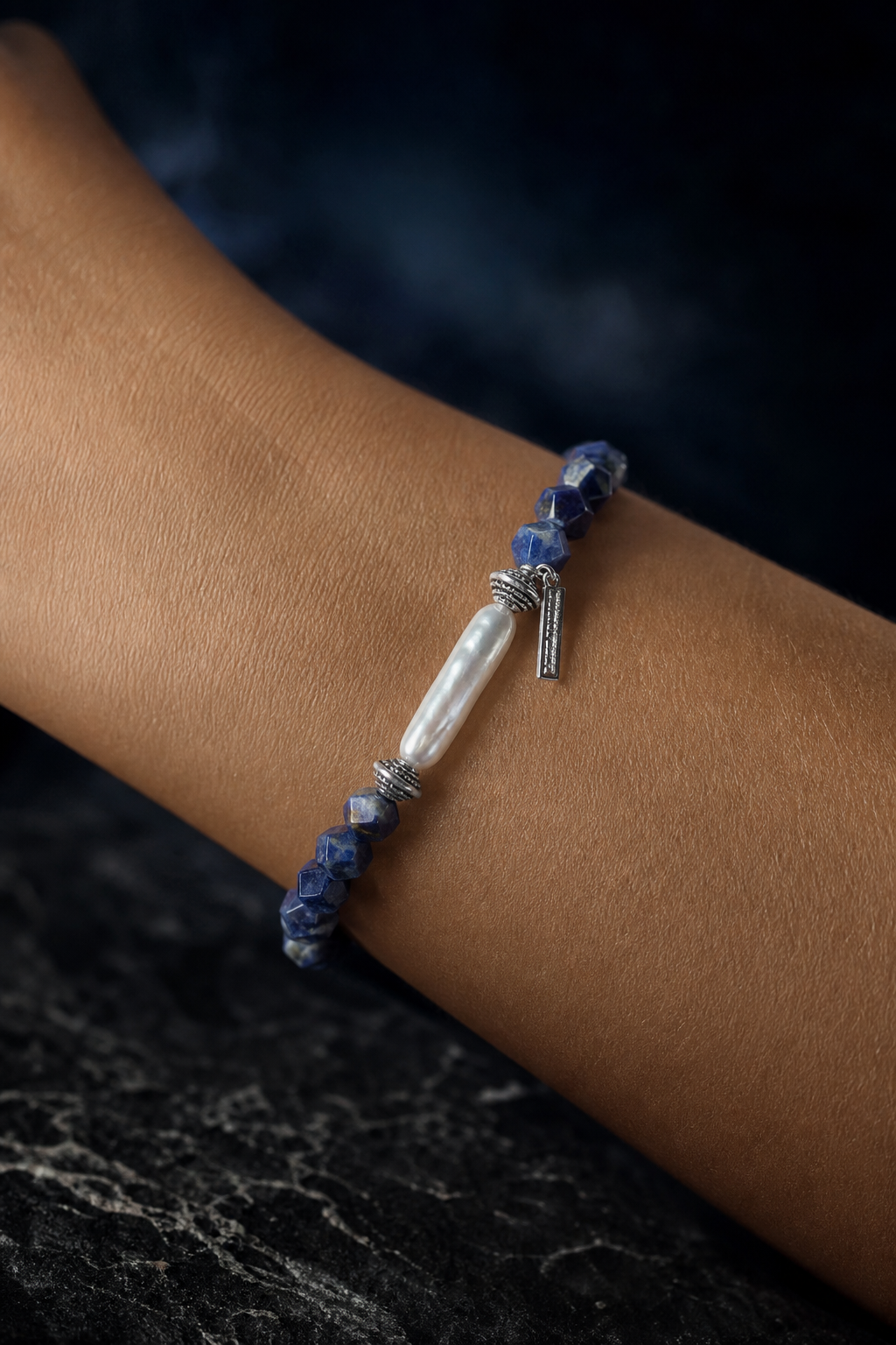 Ice Current Blue Pearl Bracelet faceless model close-up