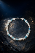 Ice Thread Blue Quartz Necklace front view on a dark atmospheric backdrop