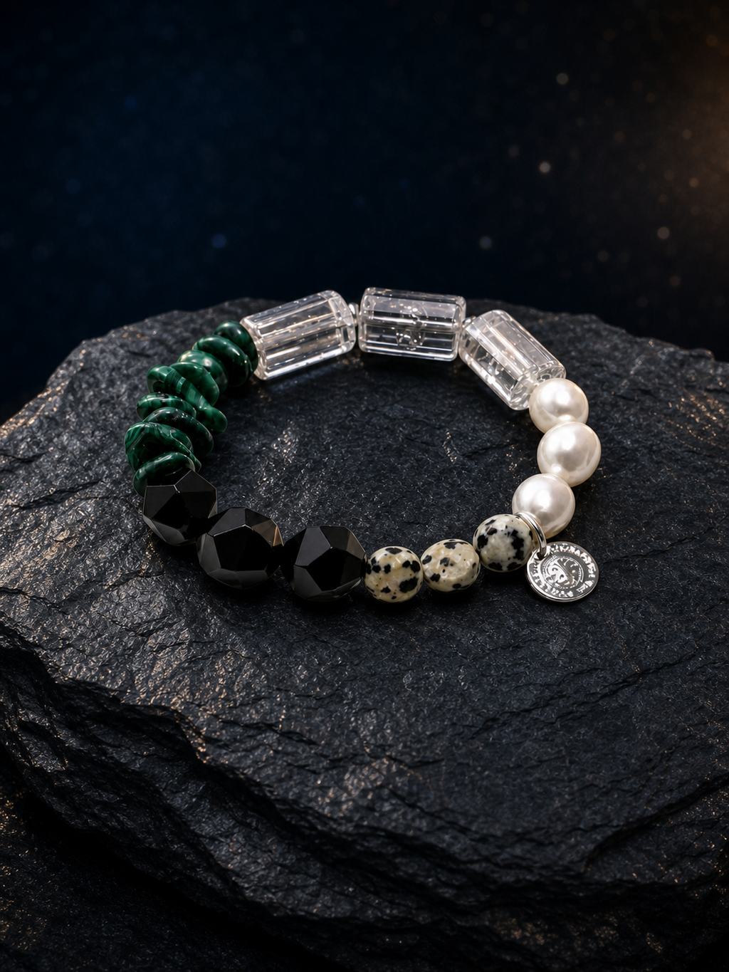 Ink Ridge Malachite Pearl Bracelet front view on a dark atmospheric backdrop