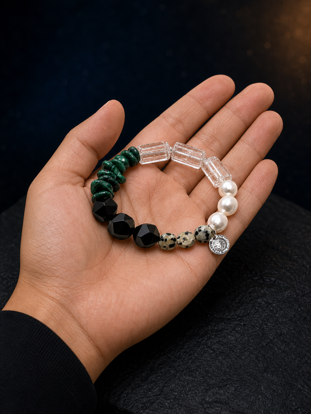 Ink Ridge Malachite Pearl Bracelet shown in hand for scale