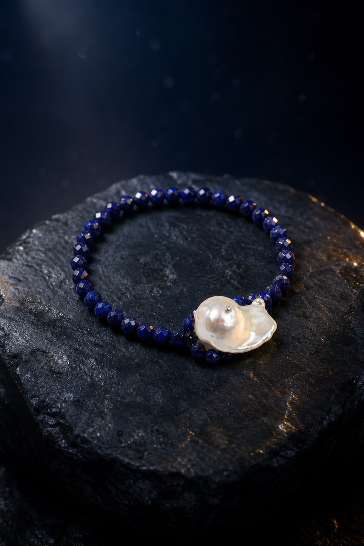Midnight Lapis Pearl Bracelet front view on a dark atmospheric backdrop