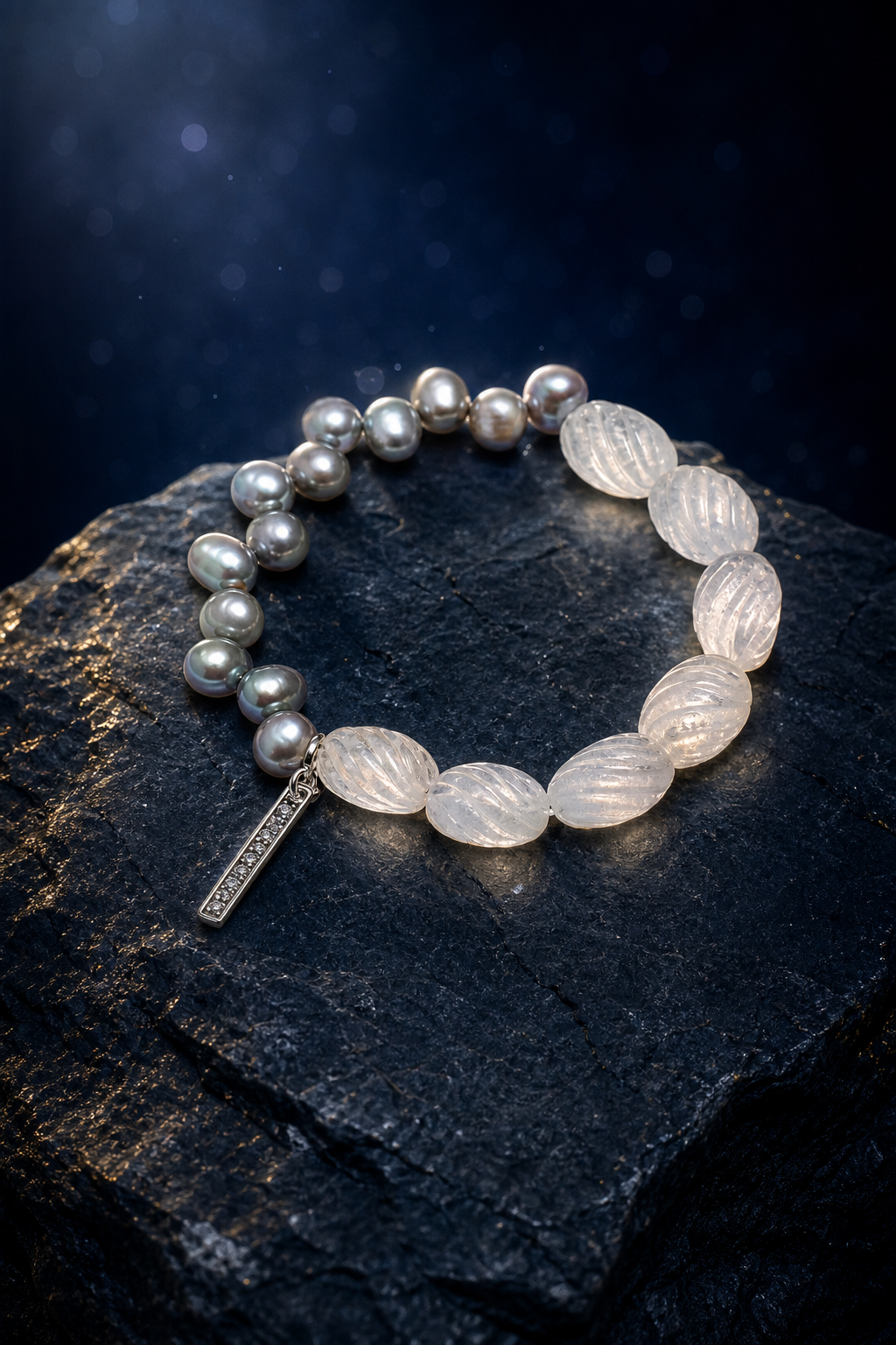 Mistglass Quartz Pearl Bracelet front view on a dark atmospheric backdrop
