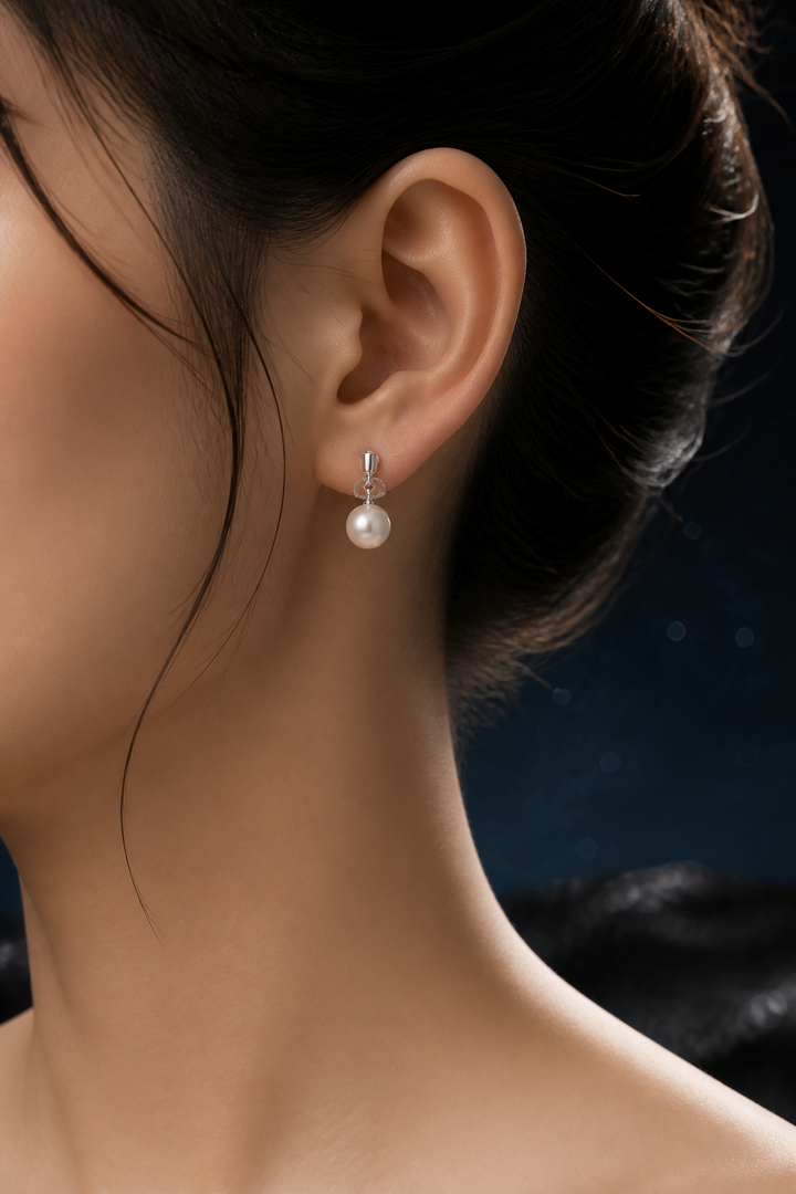 Moondrop Pearl Stud Earrings faceless model close-up