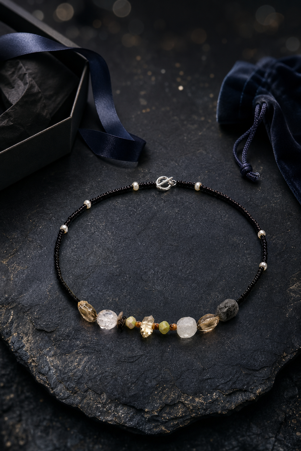 Nightguard Smoky Quartz Necklace packaging flat lay