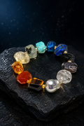 Prism Current Gem Bracelet front view on a dark atmospheric backdrop