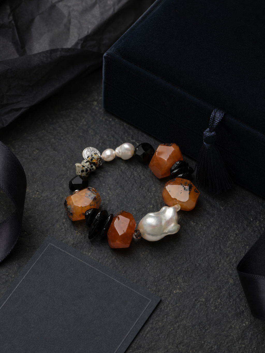 Red Tide Baroque Pearl Bracelet packaging flat lay