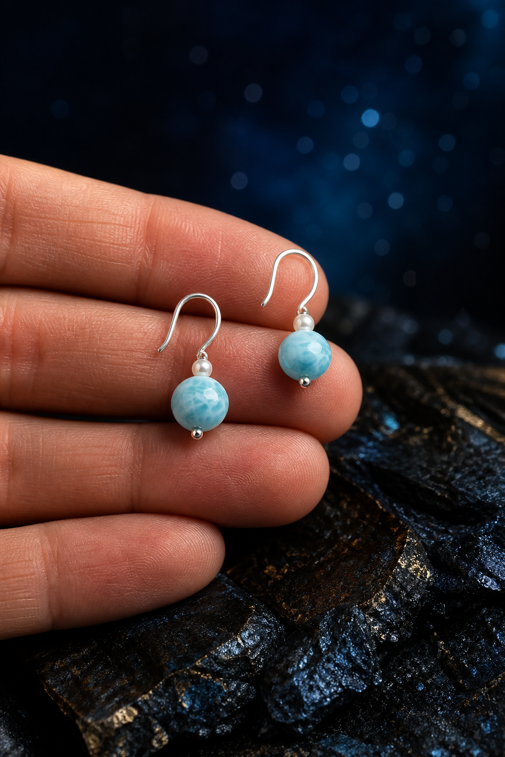 Ripple Light Larimar Earrings (3.3 cm) shown in hand for scale