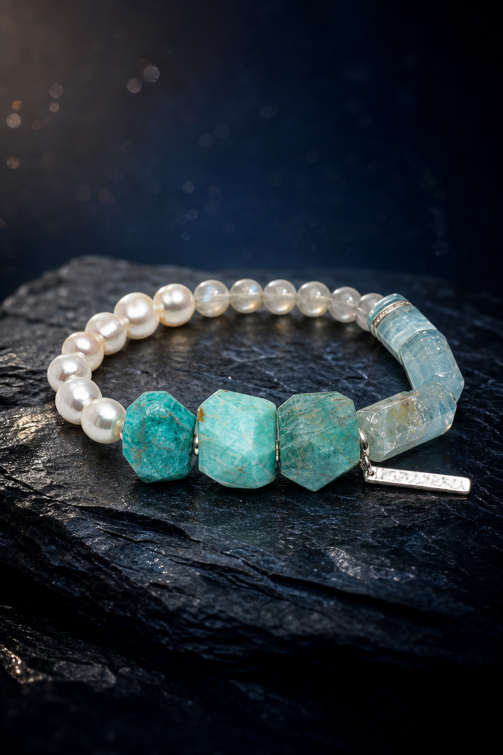 River Hush Amazonite Moonstone Bracelet front view on a dark atmospheric backdrop