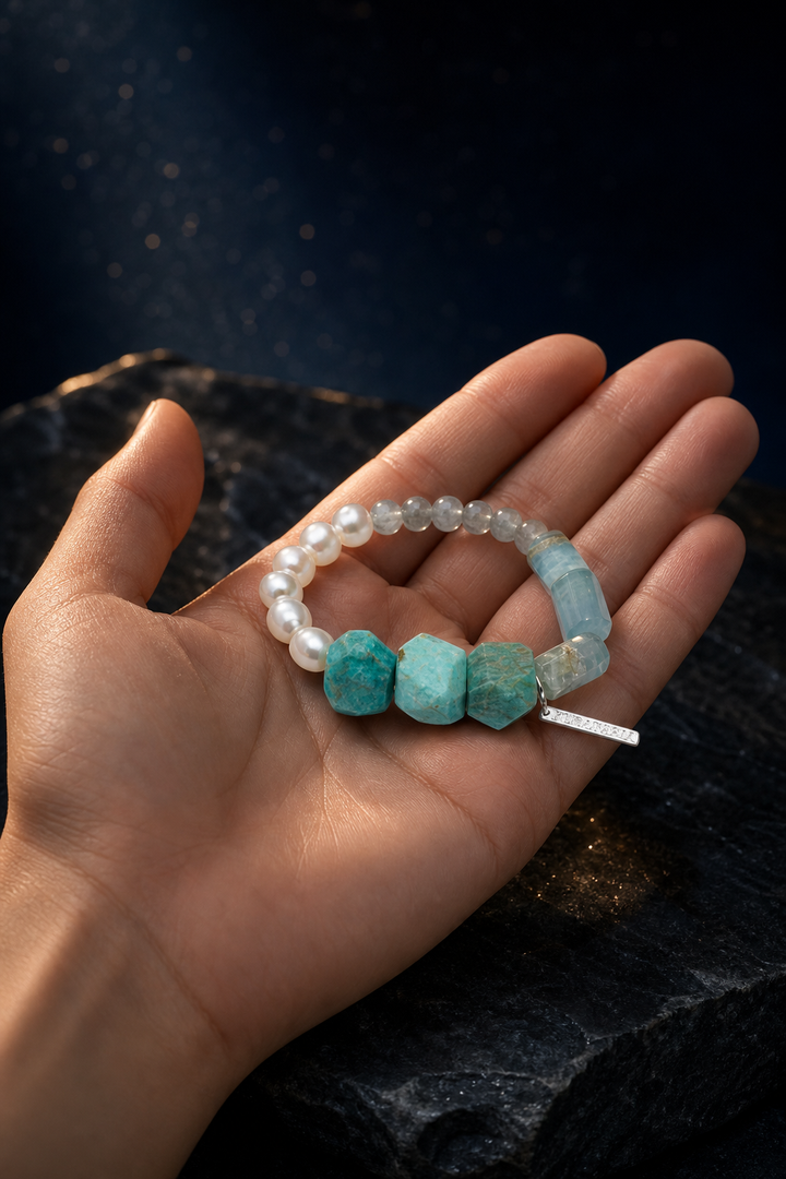 River Hush Amazonite Moonstone Bracelet shown in hand for scale