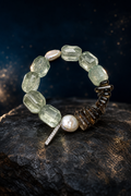 Verdant Ember Crystal Pearl Bracelet front view on a dark atmospheric backdrop