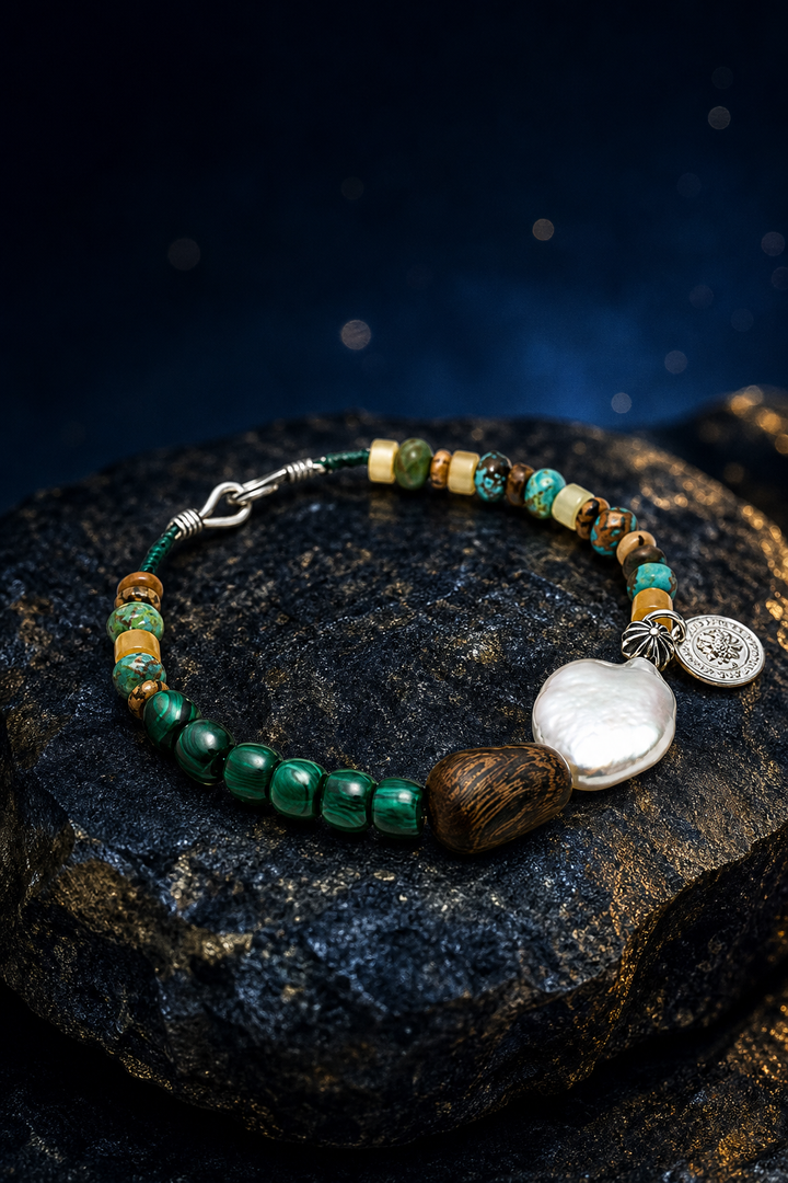 Verdant Lark Malachite Pearl Bracelet front view on a dark atmospheric backdrop