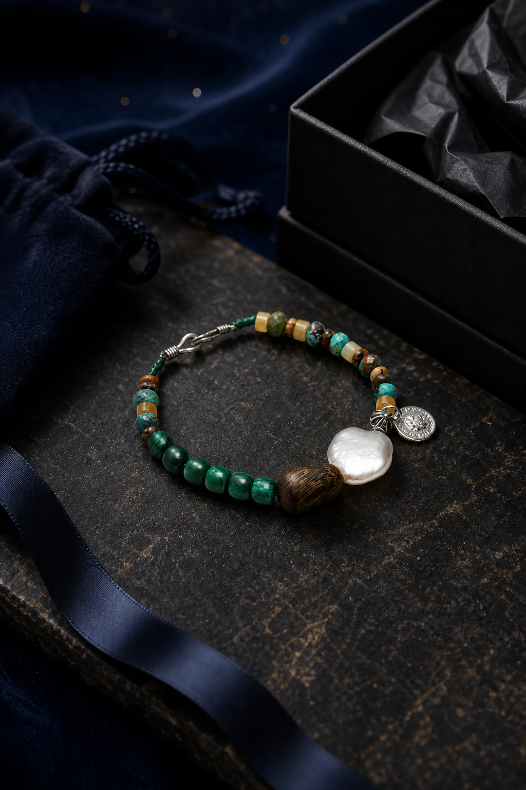 Verdant Lark Malachite Pearl Bracelet packaging flat lay