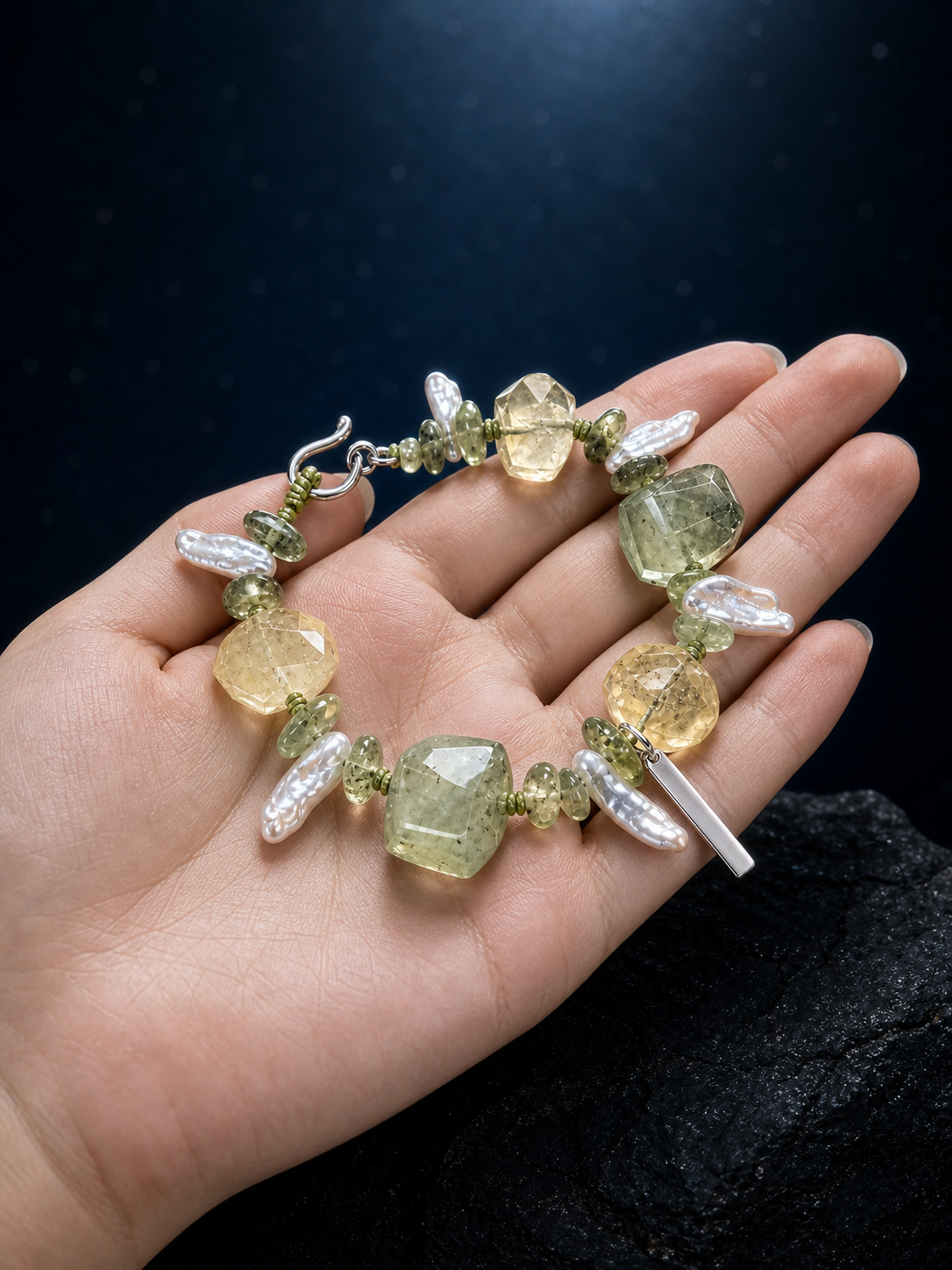 Verde Current Prehnite Citrine Bracelet shown in hand for scale