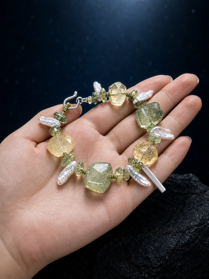 Verde Current Prehnite Citrine Bracelet shown in hand for scale
