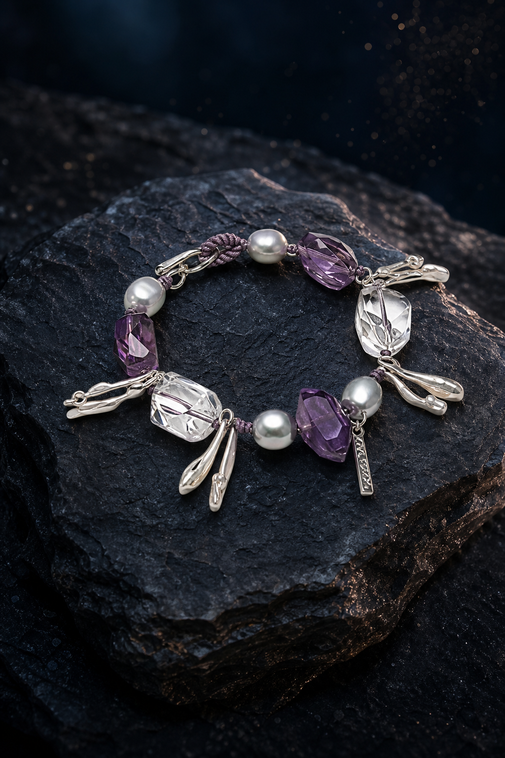 Violet Tide Amethyst Pearl Bracelet (14.5 / 15 / 16 cm) front view on a dark atmospheric backdrop