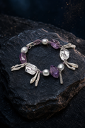 Violet Tide Amethyst Pearl Bracelet (14.5 / 15 / 16 cm) front view on a dark atmospheric backdrop