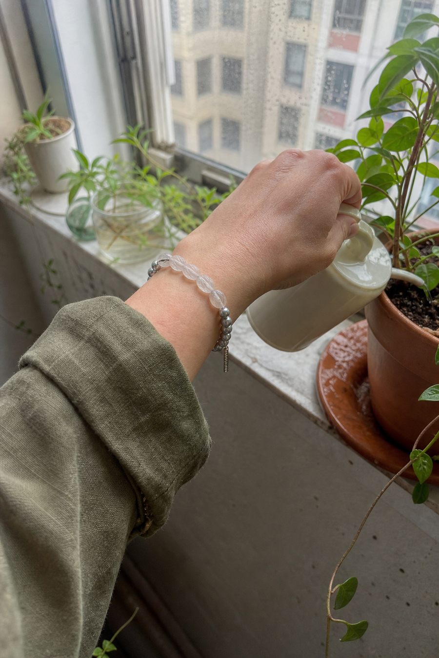 Mistglass Quartz Pearl Bracelet worn by a customer