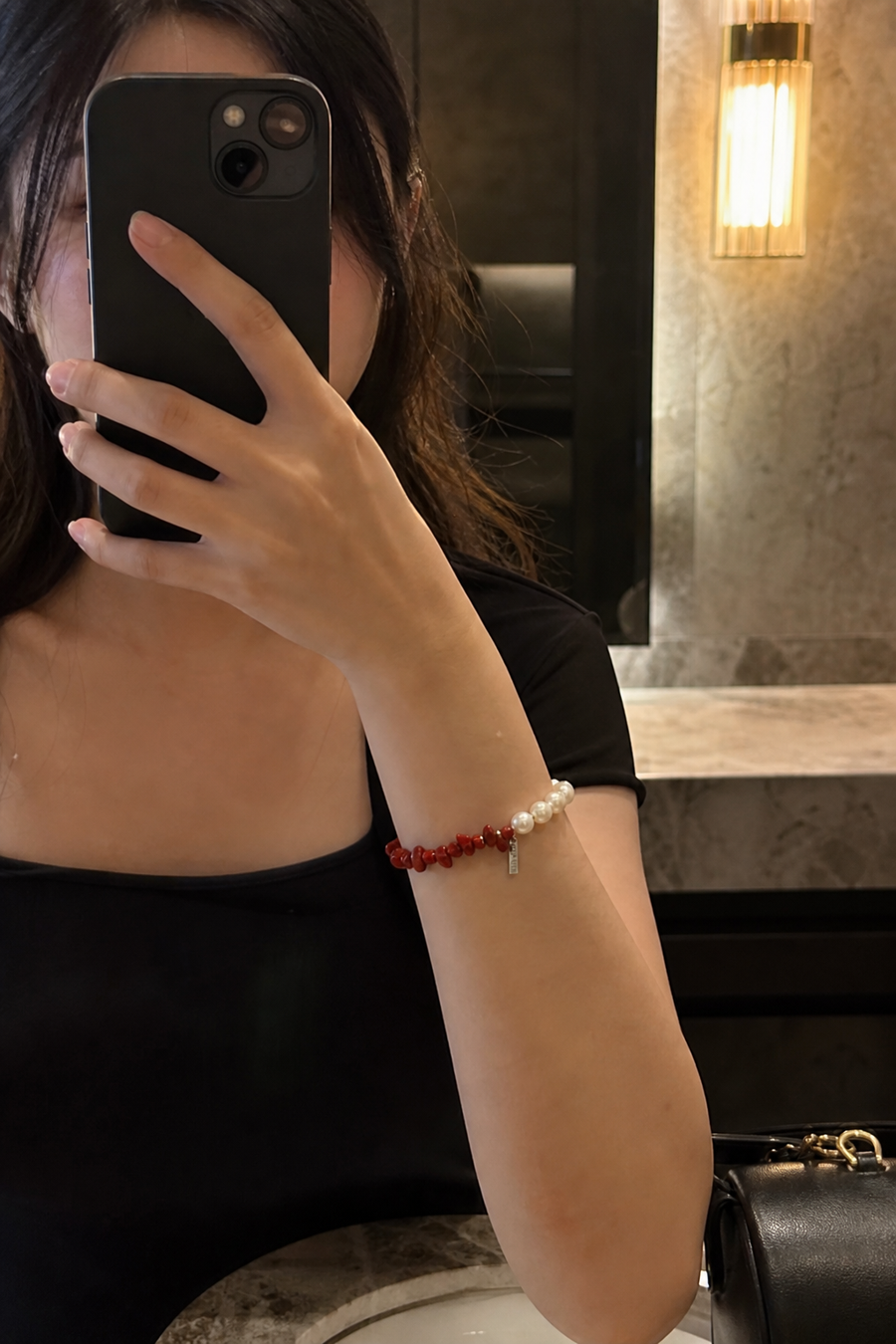 Red Current Baroque Pearl Bracelet worn by a customer