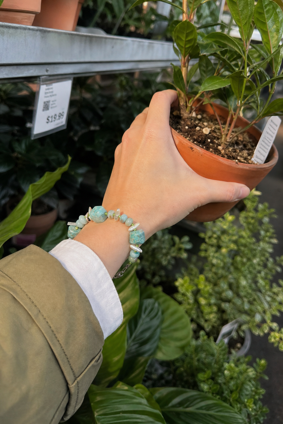 Verdant Rain Malachite Pearl Bracelet worn by a customer